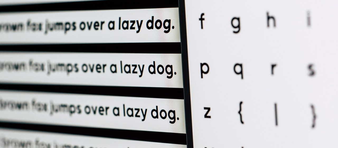 A photograph of a front picking screen. On the left are three different styles of the same font showing the end of the same sentence in three different styles. On the right are some of the individual glyphs from the font. 