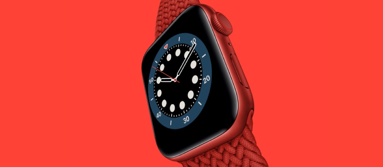 A large image of an Apple Watch with a watch face on a red background